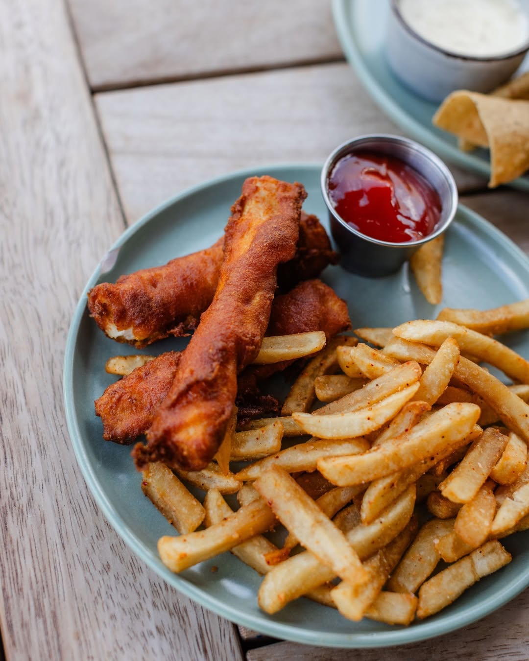 Plate of fish sticks and french fries